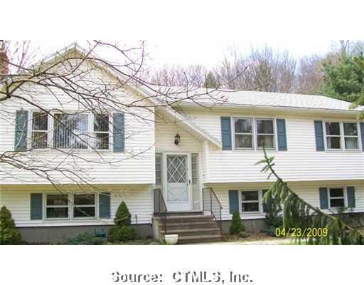 20 Sheffield Road North Haven, CT 06473 - Photo 1 of 1 Exterior Front. Very attractive raised ranch on dead end street. Rear lot for wonderful privacy. Backs to 48 acres of open space. A must see.