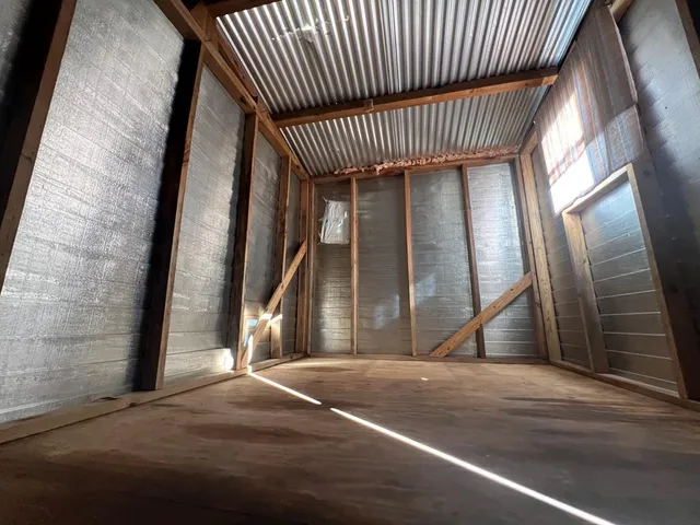 a view of a livingroom with stairs