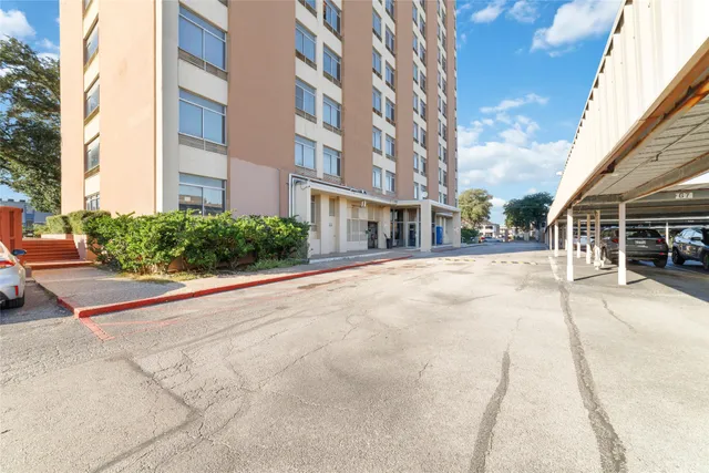 a view of a building with a street