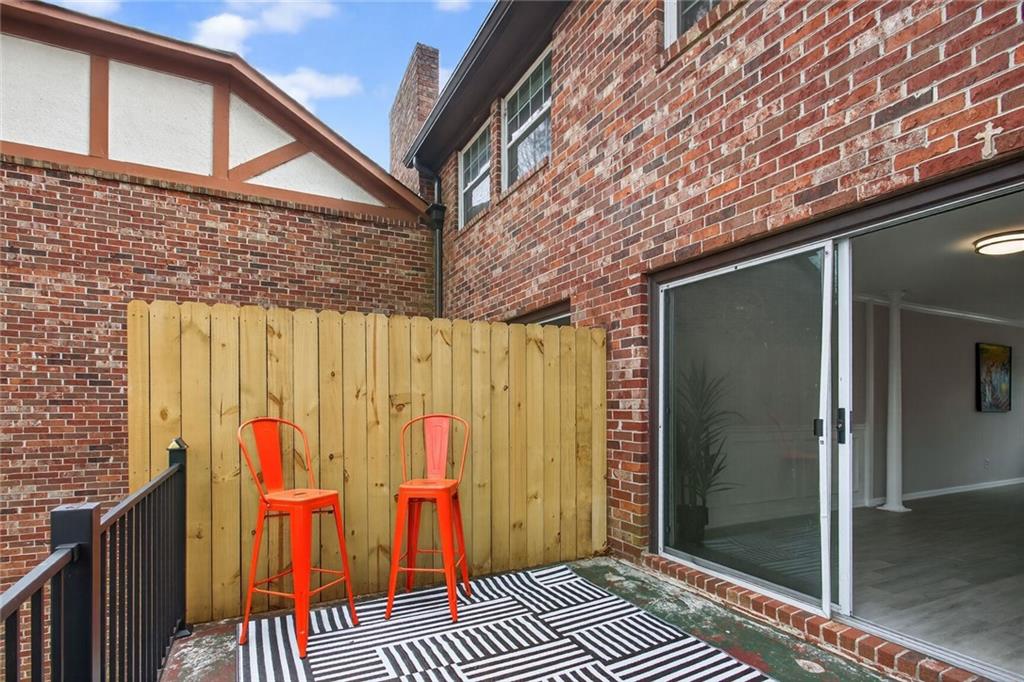 2825 Northeast Expressway, Unit J3 Atlanta, GA 30345 - Photo 13 of 23 a view of outdoor space with wooden floor and door
