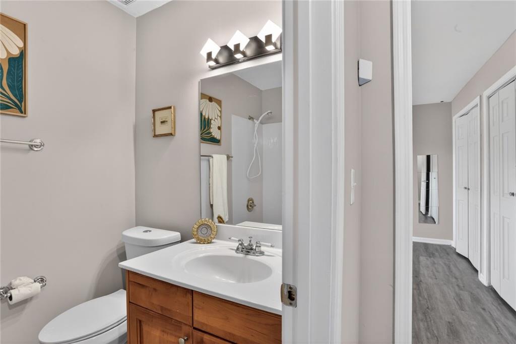 2825 Northeast Expressway, Unit J3 Atlanta, GA 30345 - Photo 21 of 23 a bathroom with a sink vanity granite and toilet