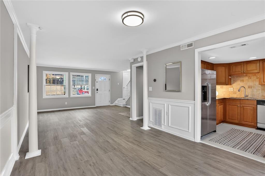 2825 Northeast Expressway, Unit J3 Atlanta, GA 30345 - Photo 8 of 23 a view of a room with wooden floor and window