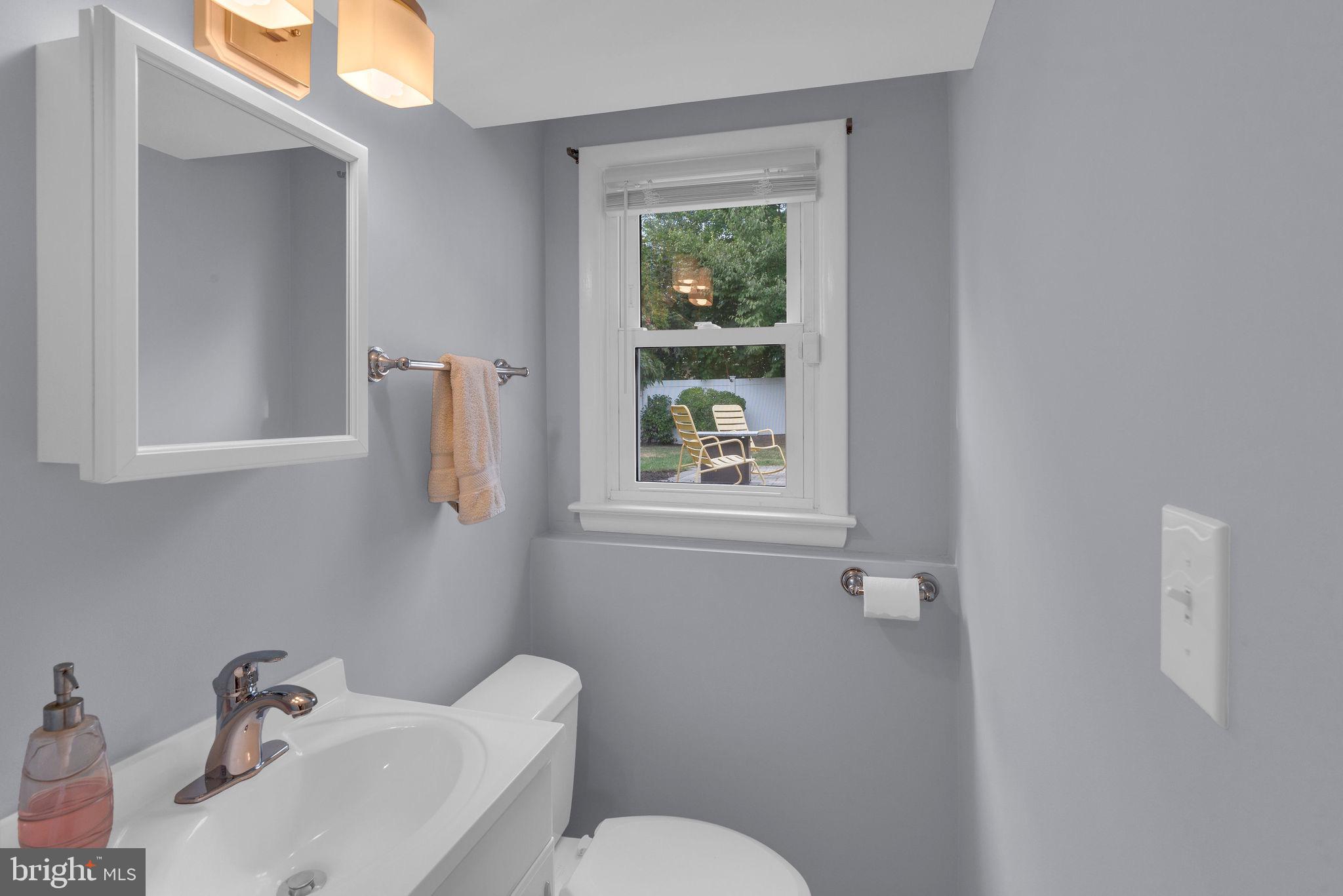 8 Dailey Drive Hamilton, NJ 08620 - Photo 33 of 46 a bathroom with a sink mirror and toilet