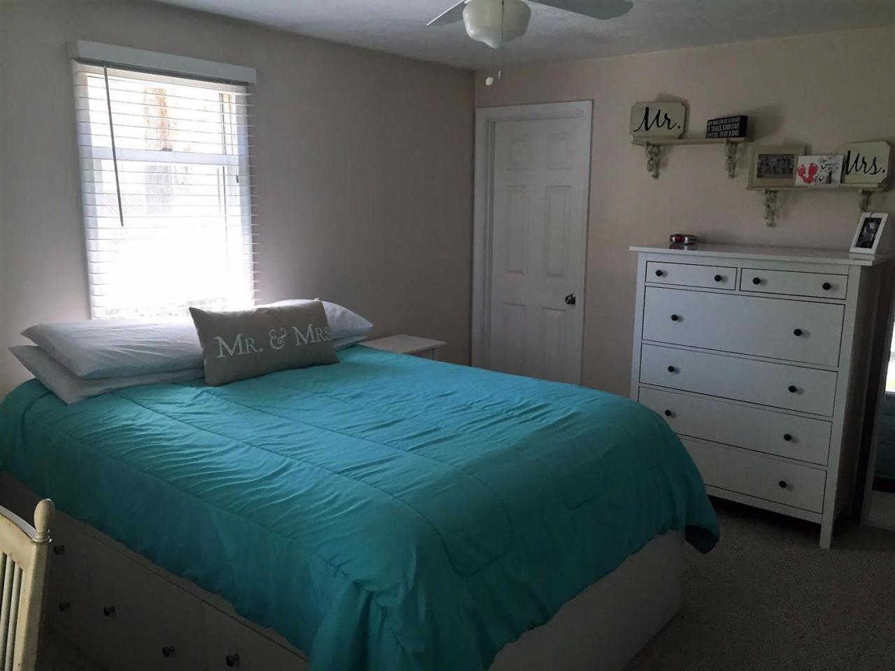 64 Edgewater Road Mashpee, MA 02649 - Photo 14 of 18 a bedroom with a bed and a window