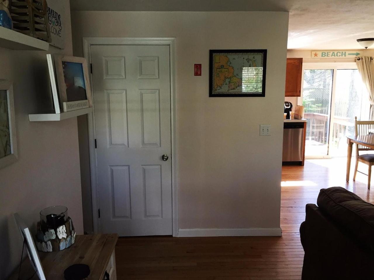 64 Edgewater Road Mashpee, MA 02649 - Photo 6 of 18 a view of hallway with furniture and a window