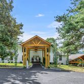a view of a parked cars in front of a house