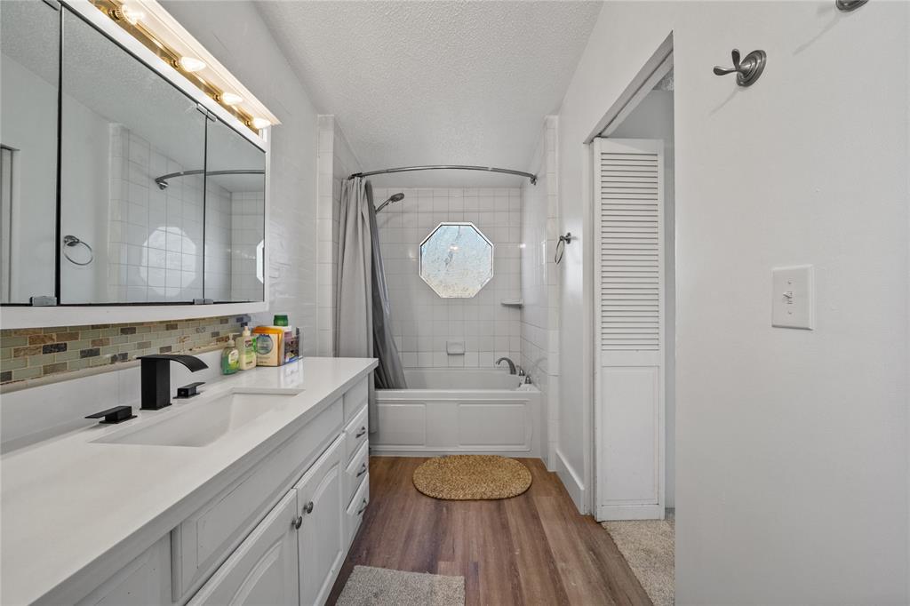 169 Cumberland Trail Bridgeport, TX 76426 - Photo 16 of 23 a bathroom with a sink a toilet and shower