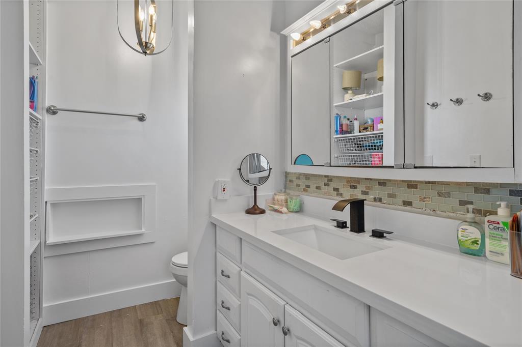 169 Cumberland Trail Bridgeport, TX 76426 - Photo 17 of 23 a bathroom with a sink and a mirror