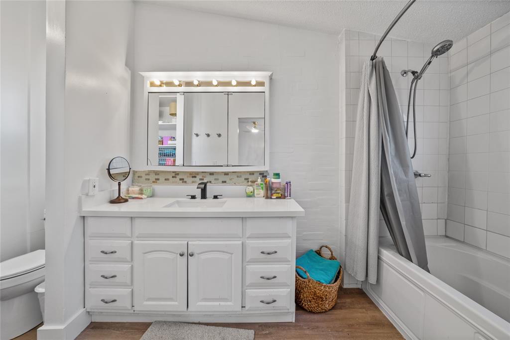 169 Cumberland Trail Bridgeport, TX 76426 - Photo 18 of 23 a bathroom with a sink a toilet and shower