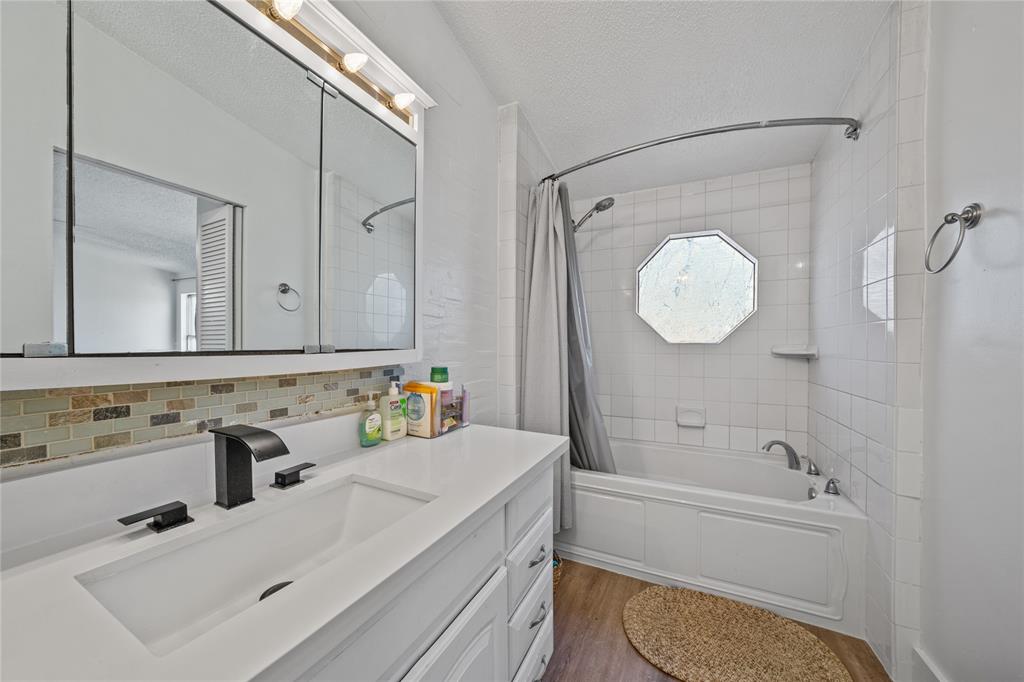 169 Cumberland Trail Bridgeport, TX 76426 - Photo 19 of 23 a bathroom with a sink a toilet and shower
