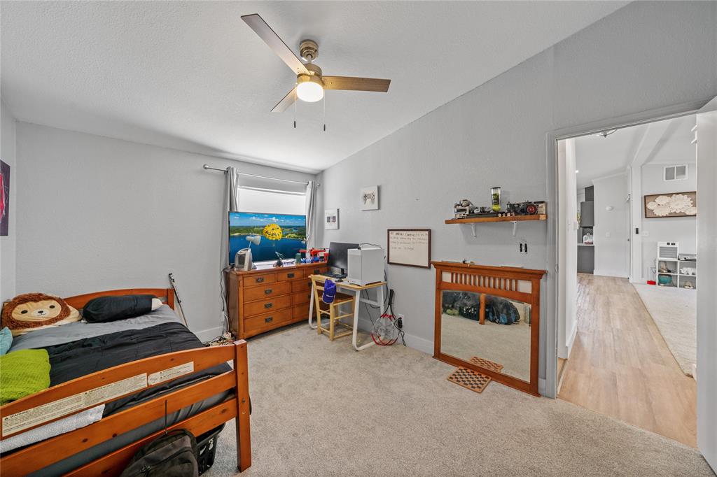 169 Cumberland Trail Bridgeport, TX 76426 - Photo 21 of 23 a living room with furniture and a wooden floor