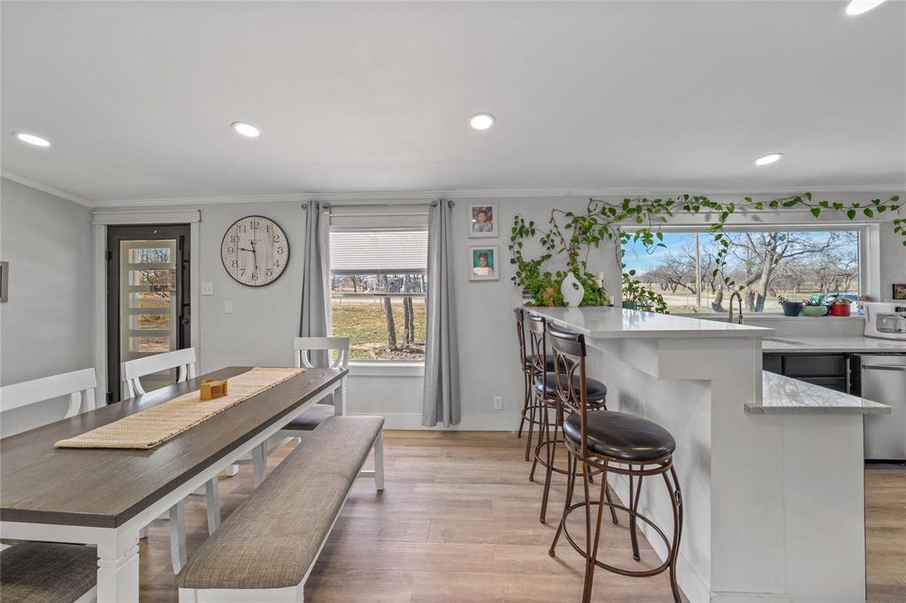 169 Cumberland Trail Bridgeport, TX 76426 - Photo 7 of 23 a kitchen with a table and chairs in it