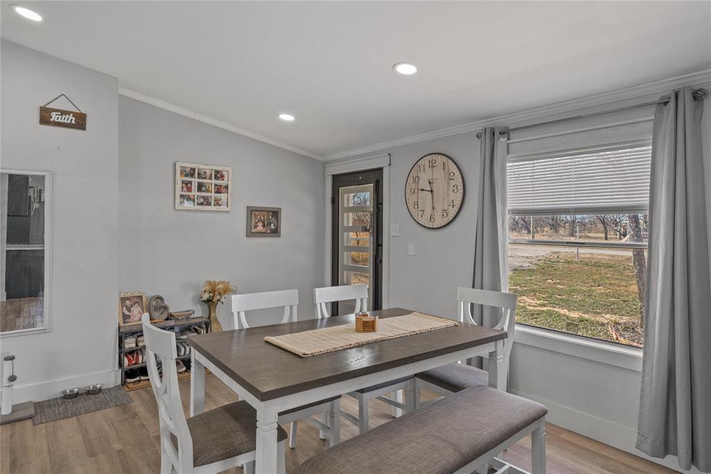 169 Cumberland Trail Bridgeport, TX 76426 - Photo 9 of 23 a view of a dining room with a table and chairs