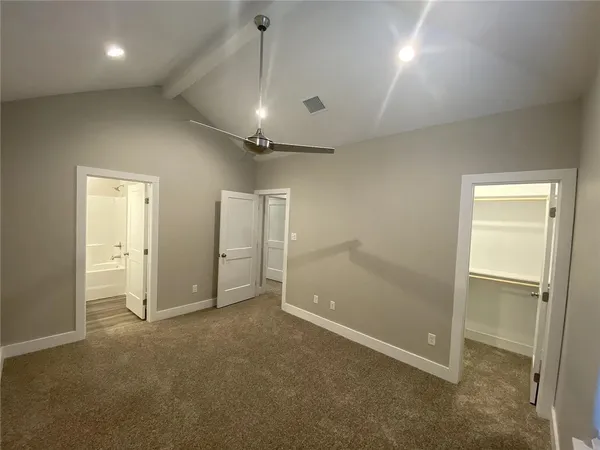 an empty room with a bathroom