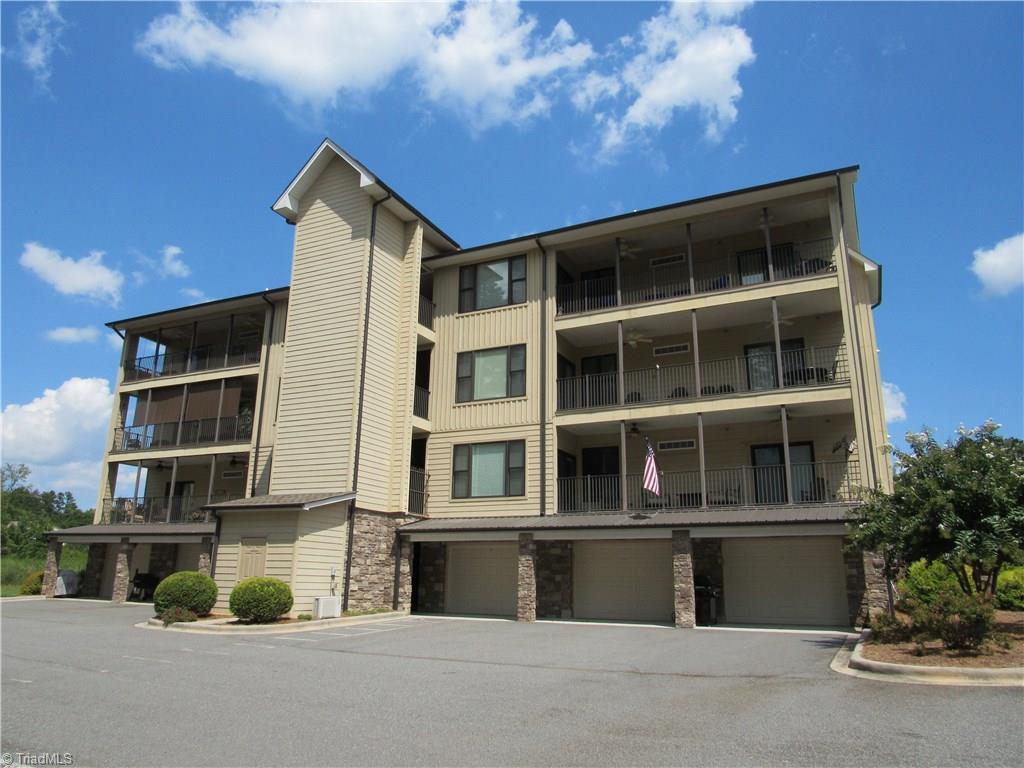 2050 Marina Pointe Road Salisbury, NC 28146 - Photo 20 of 23 Lake side of the building shows the large tandem garage.