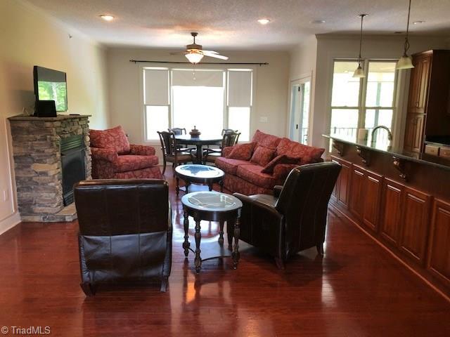 2050 Marina Pointe Road Salisbury, NC 28146 - Photo 3 of 23 Living area with beautiful hardwood floors and view of the lake.