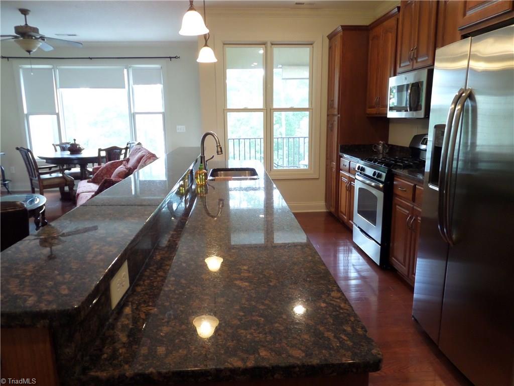 2050 Marina Pointe Road Salisbury, NC 28146 - Photo 7 of 23 Lots of counter space and a breakfast bar.