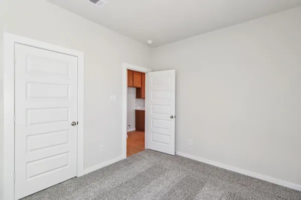 an empty room with closet