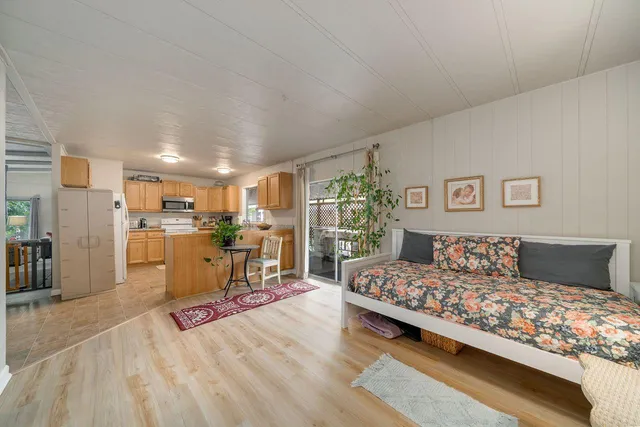 a living room with furniture and a table
