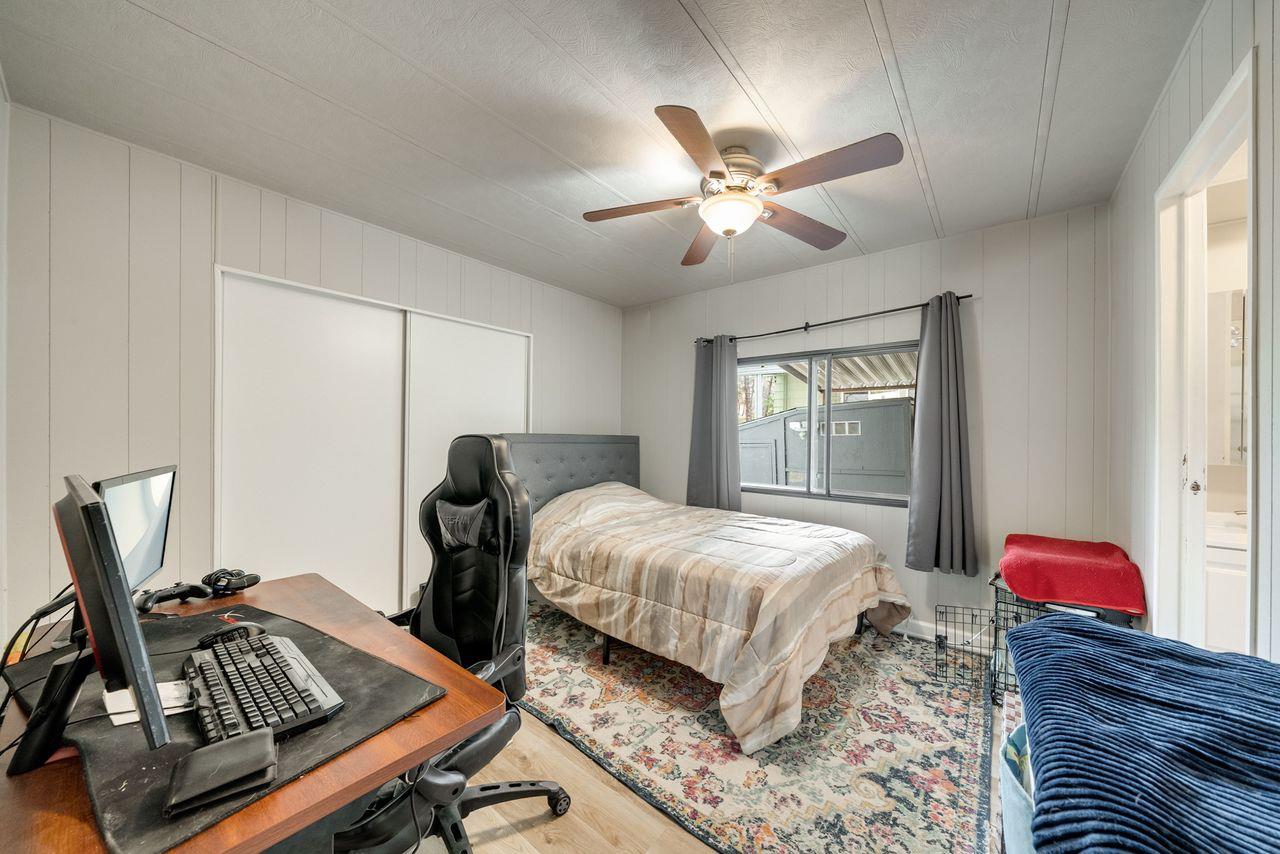 450 Gladycon Road, Unit 52 Colfax, CA 95713 - Photo 17 of 29 a bedroom with bed and a window