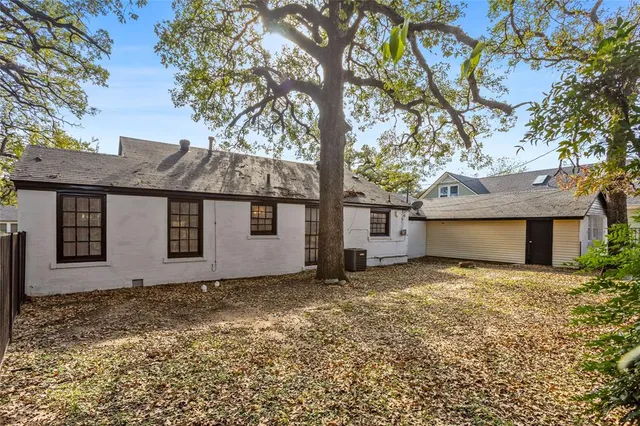 a house with yard in front of it