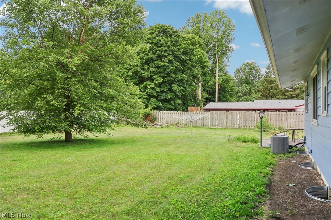6618 Chapel Road Madison, OH 44057 - Photo 29 of 30 View of yard with central AC unit