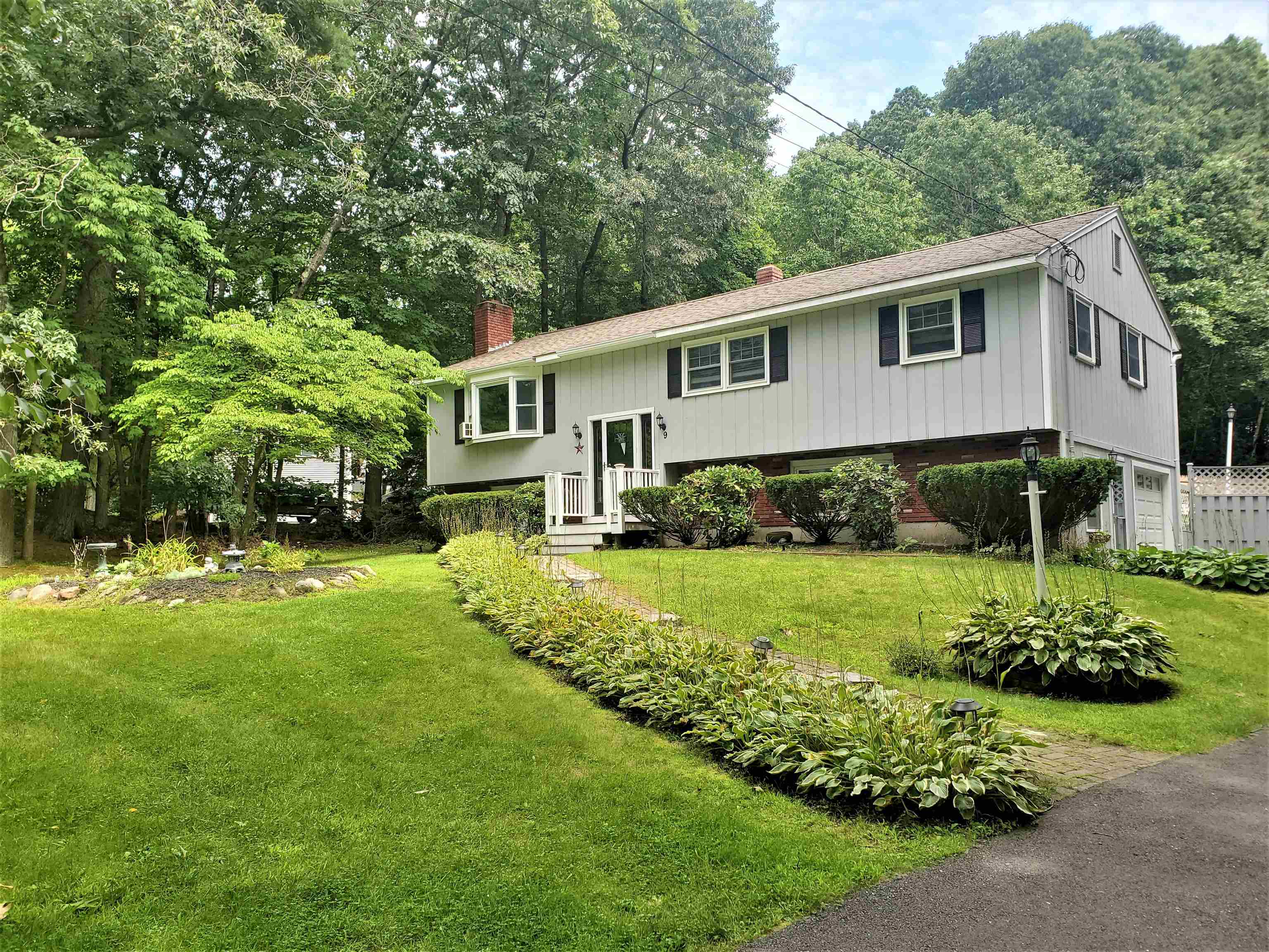 9 Sawmill Road Atkinson, NH 03811 - Photo 1 of 28 Gallery Image 1