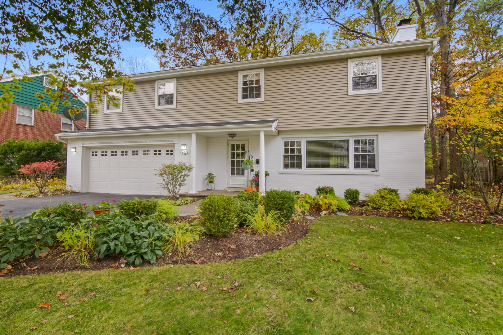 1426 Kenton Road Deerfield, IL 60015 - Photo 1 of 15 front view of a house with a yard