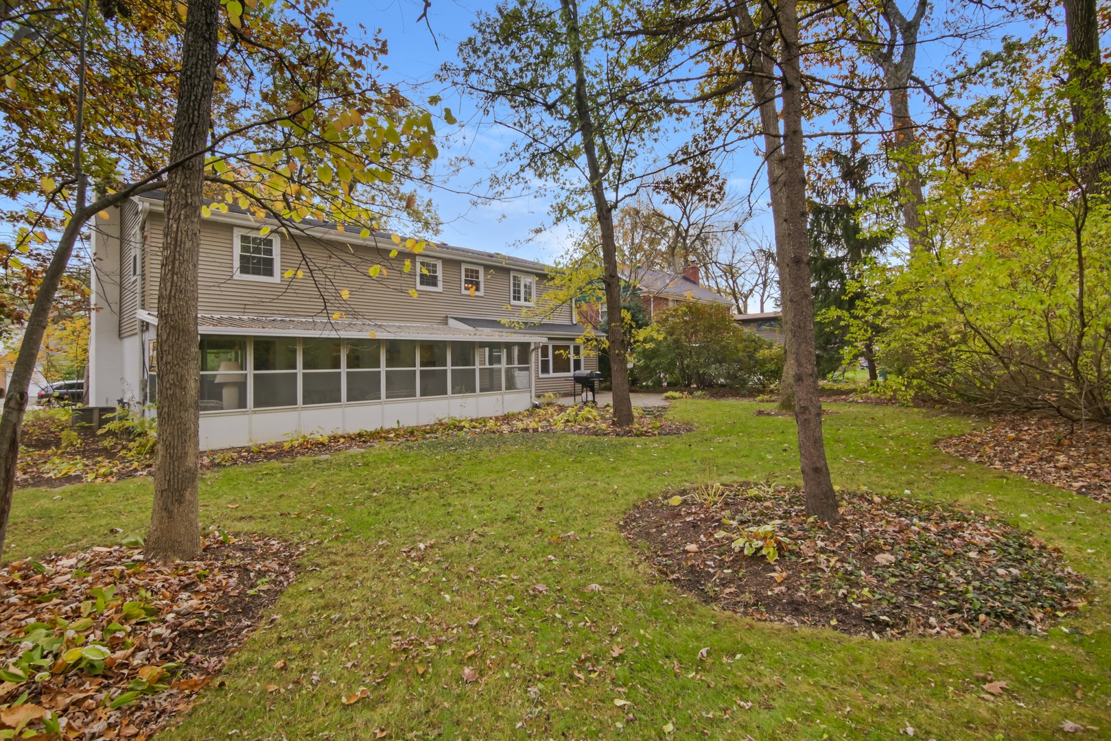 1426 Kenton Road Deerfield, IL 60015 - Photo 15 of 15 a view of a house with backyard and trees