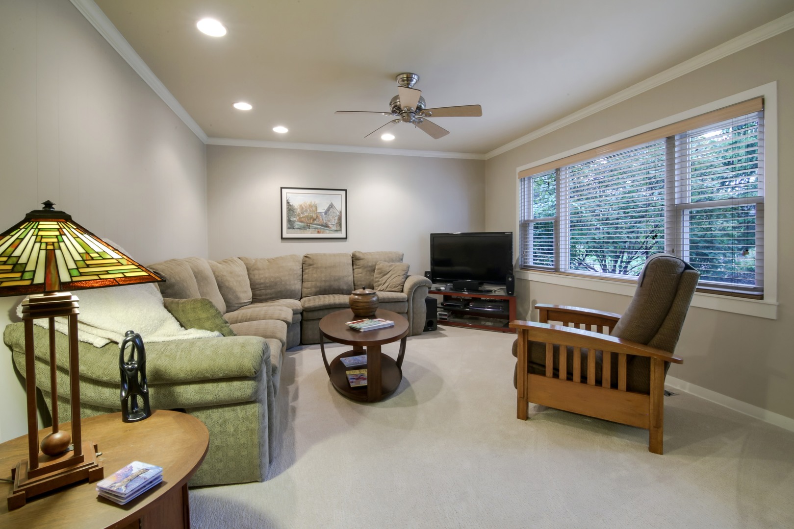 1426 Kenton Road Deerfield, IL 60015 - Photo 6 of 15 a living room with furniture and a flat screen tv