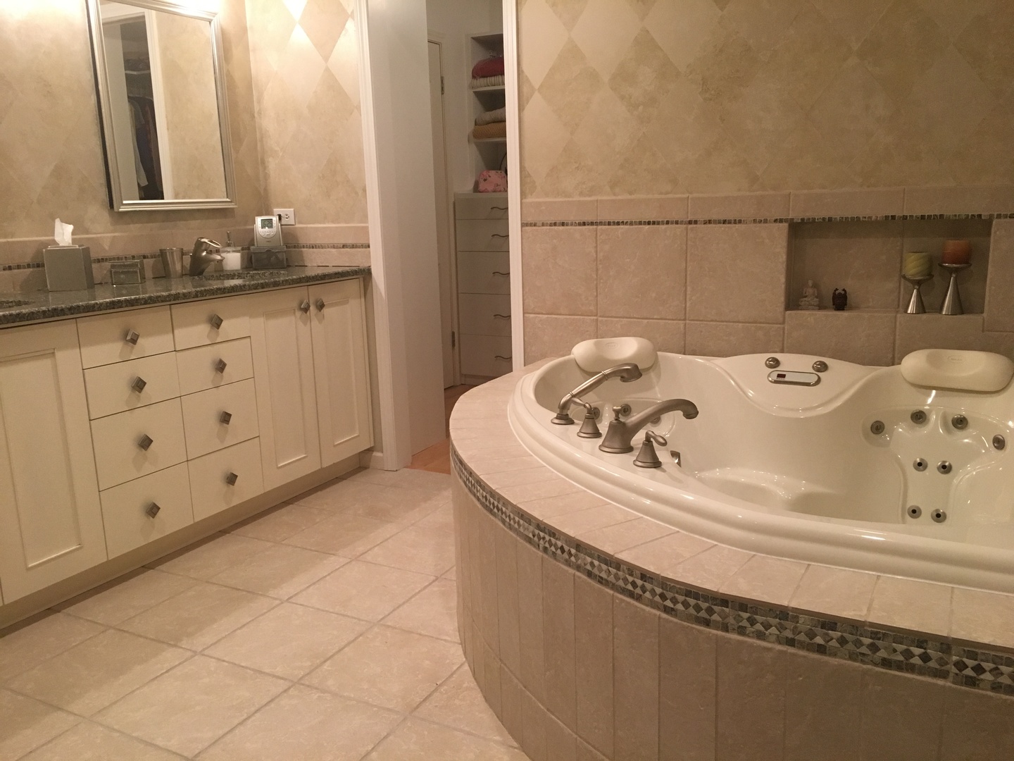 1426 Kenton Road Deerfield, IL 60015 - Photo 9 of 15 a bathroom with a sink and a mirror