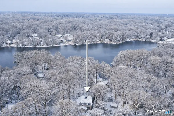a view of a wooden floor and a lake view
