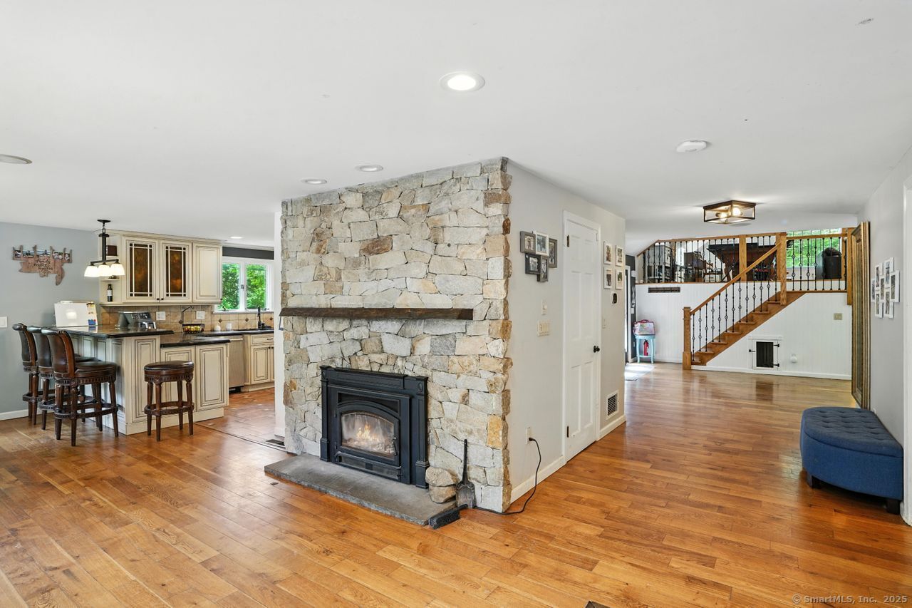 68 Old Dike Road Trumbull, CT 06611 - Photo 19 of 41 a living room with furniture and a fireplace