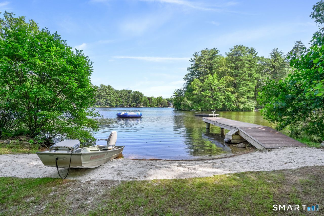 68 Old Dike Road Trumbull, CT 06611 - Photo 2 of 40 a view of a lake with sitting area