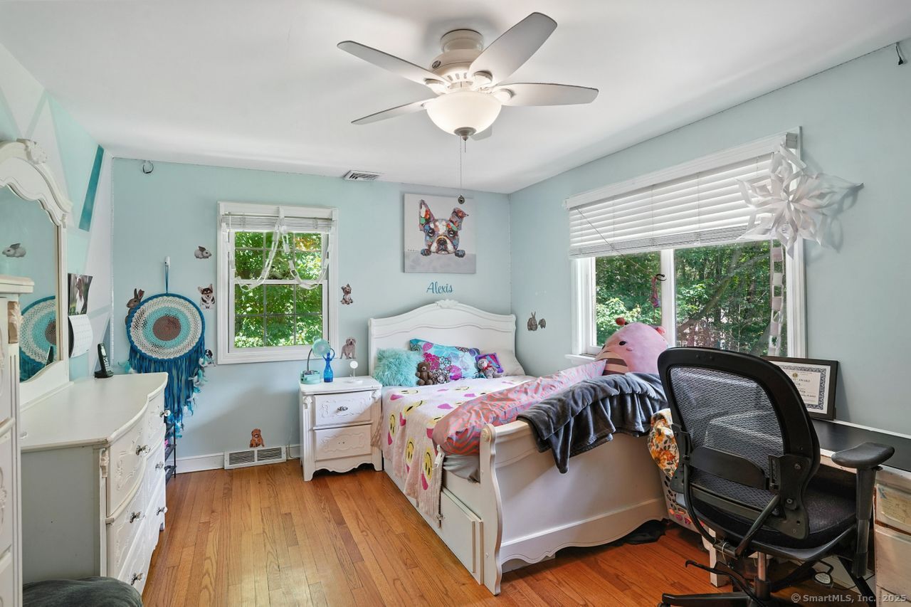 68 Old Dike Road Trumbull, CT 06611 - Photo 22 of 40 a bedroom with a bed a window and dresser