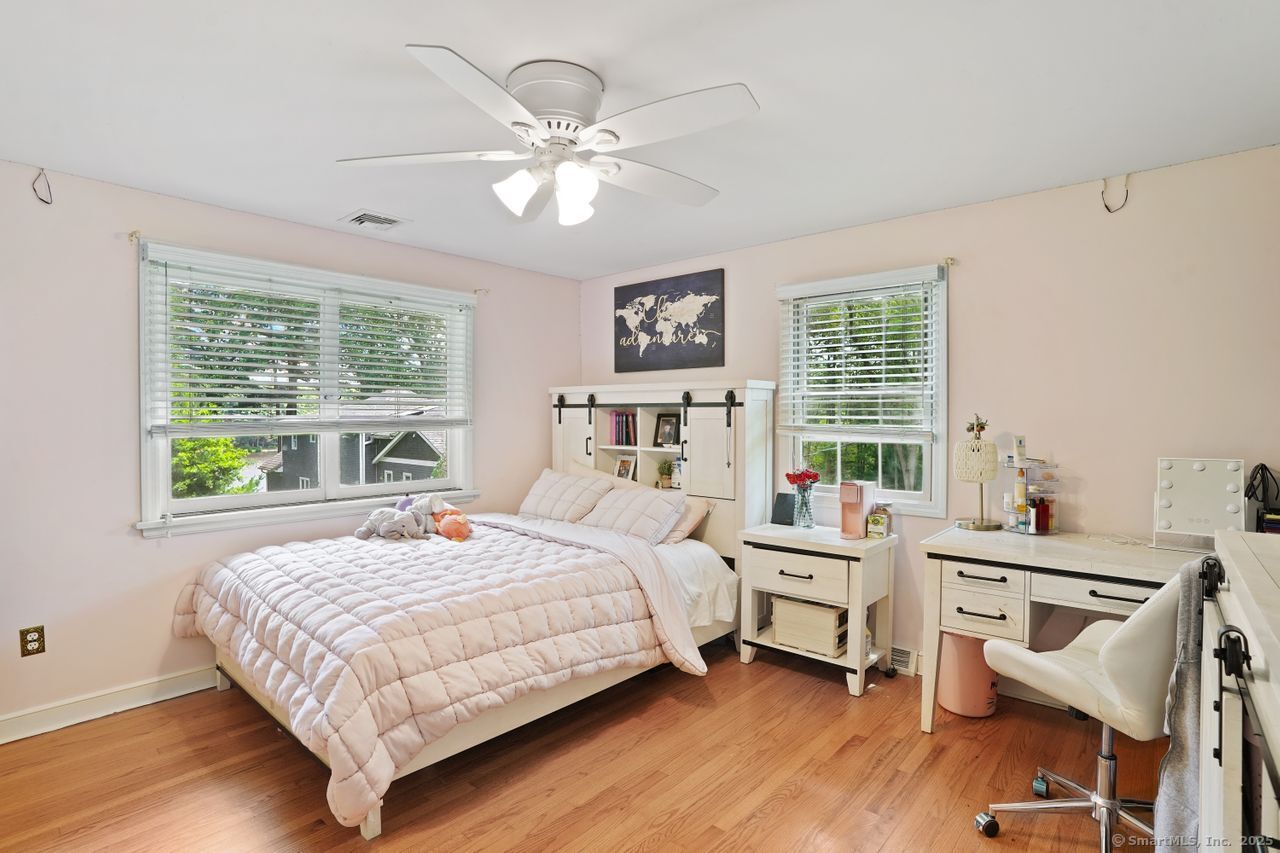 68 Old Dike Road Trumbull, CT 06611 - Photo 26 of 40 a bedroom with a bed and a large window