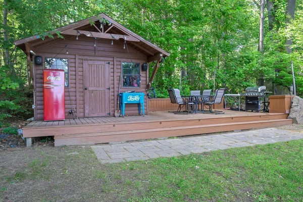 a view of house with a outdoor space