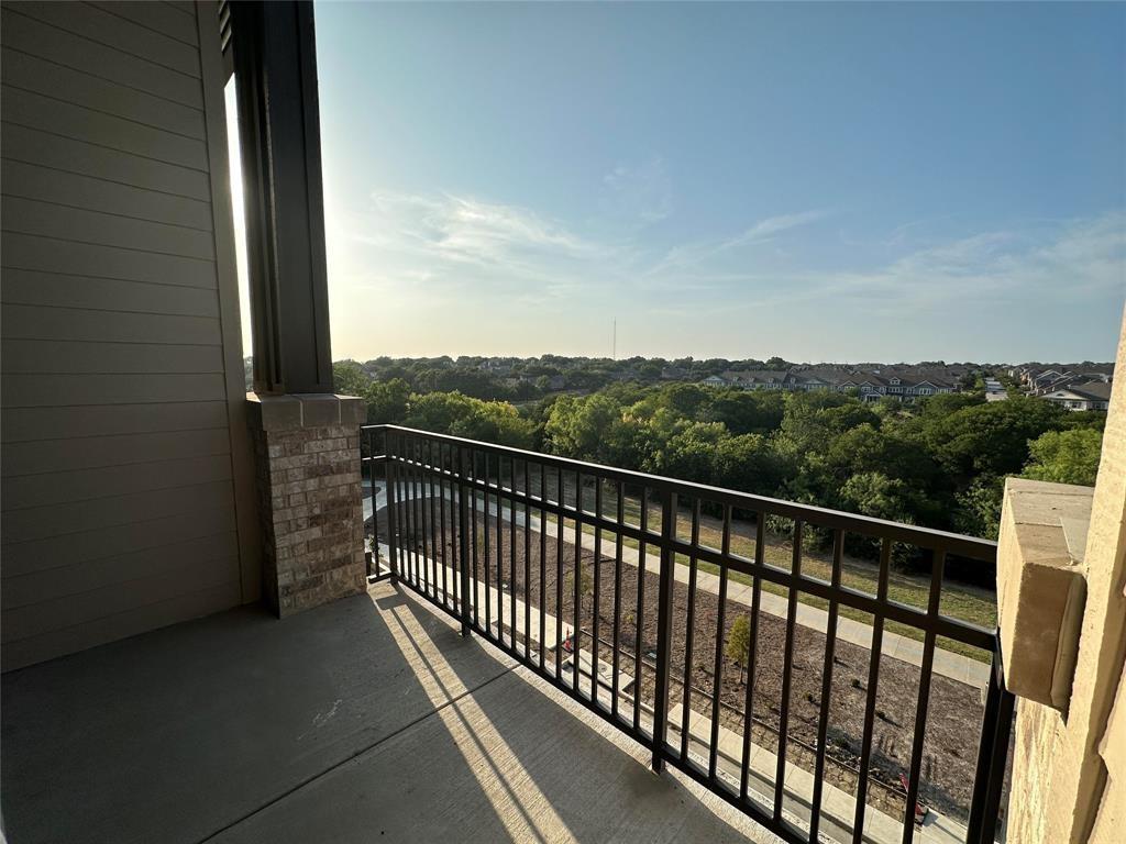 2700 Old Denton Road, Unit 4434 Carrollton, TX 75007 - Photo 12 of 13 a balcony with street view