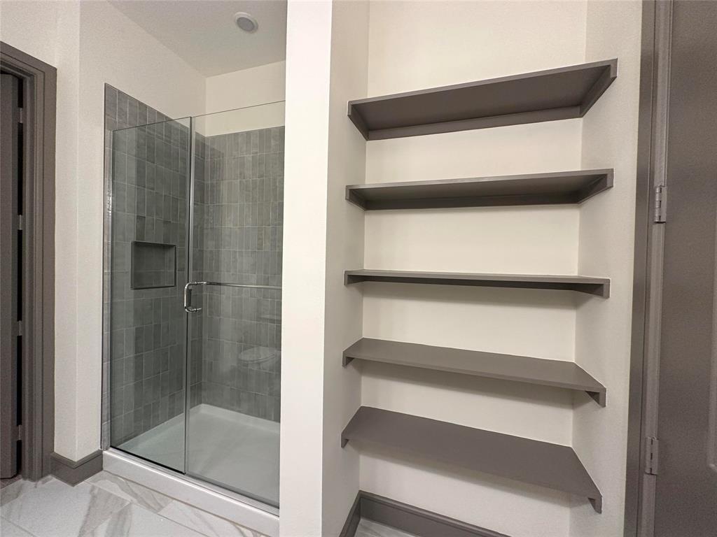2700 Old Denton Road, Unit 4434 Carrollton, TX 75007 - Photo 8 of 13 a bathroom with a tub and shower