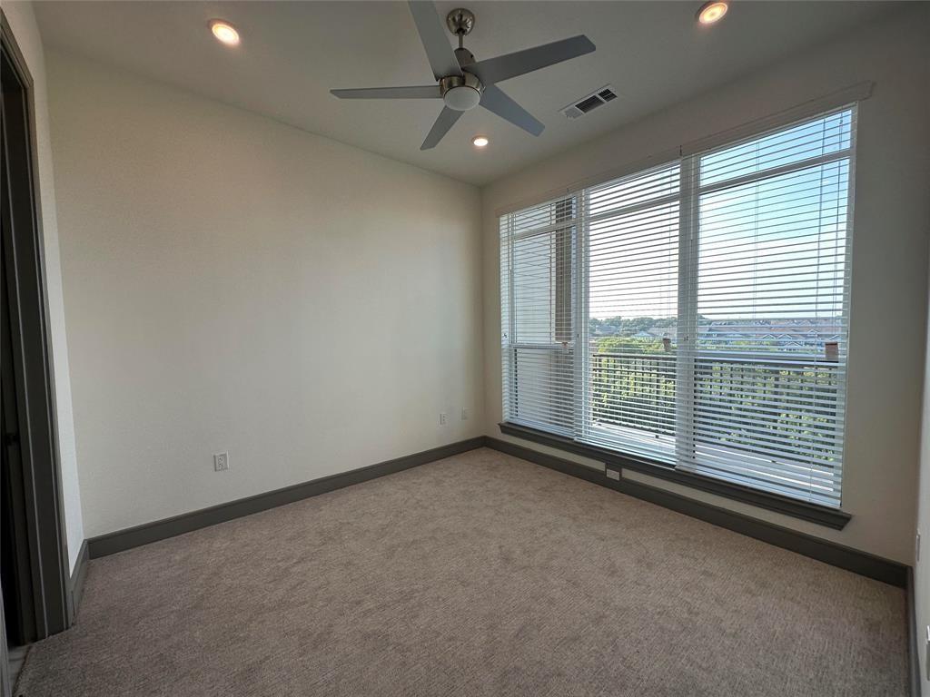2700 Old Denton Road, Unit 4434 Carrollton, TX 75007 - Photo 10 of 13 a view of an empty room with a window