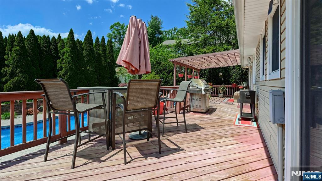 277 French Hill Road Wayne, NJ 07470 - Photo 27 of 28 a view of a chairs and table on the deck