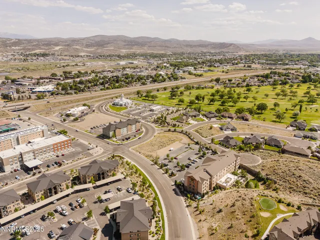 an aerial view of a city with lots of residential buildings