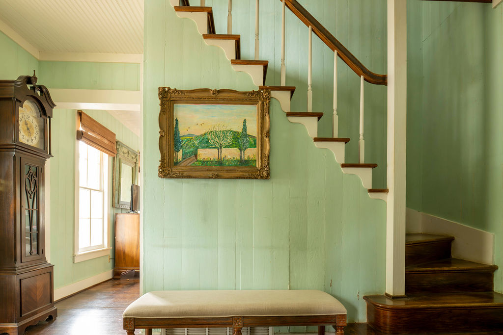 200 Bluff Street Dripping Springs, TX 78620 - Photo 2 of 16 a view of hallway with stairs and wooden floor