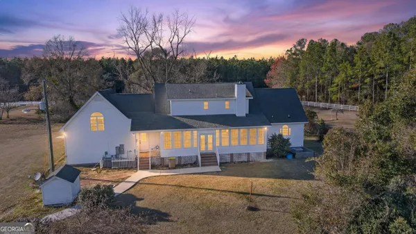 a view of a living room and entry way