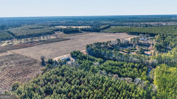 a kitchen with stainless steel appliances granite countertop a refrigerator and a stove
