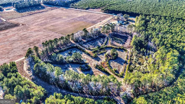 a view of a livingroom with furniture and chandelier