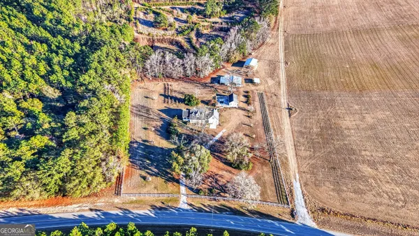 a view of a livingroom with furniture and chandelier