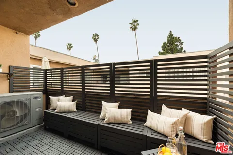 a view of a balcony with a couch