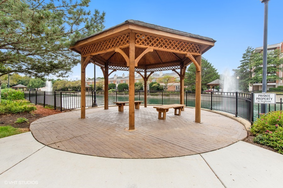351 Town Pl Circle, Unit 405 Buffalo Grove, IL 60089 - Photo 13 of 13 a view of a swimming pool with a patio