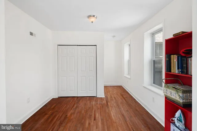 a view of entryway with wooden floor